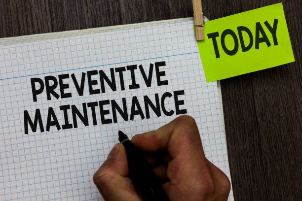 Word writing text Preventive Maintenance. Business concept for Avoid Breakdown done while machine still working Man holding marker notebook clothespin hold reminder wooden background